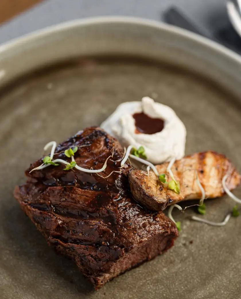 Chargrilled steak with grilled vegetables and a whipped dip