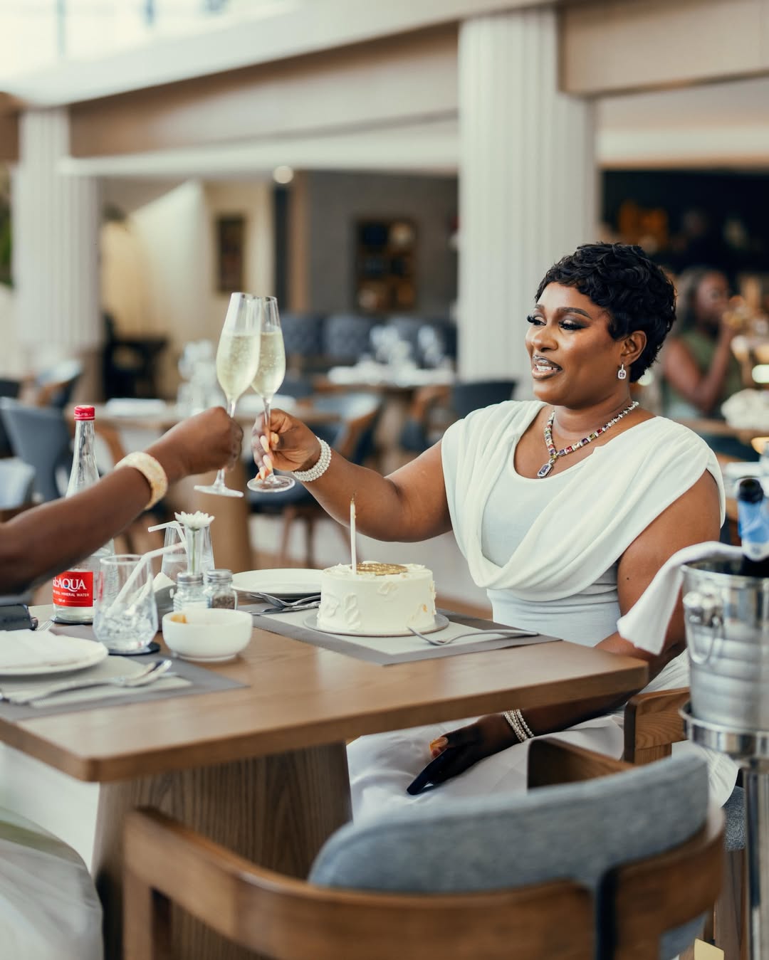 Guest celebrating with champagne